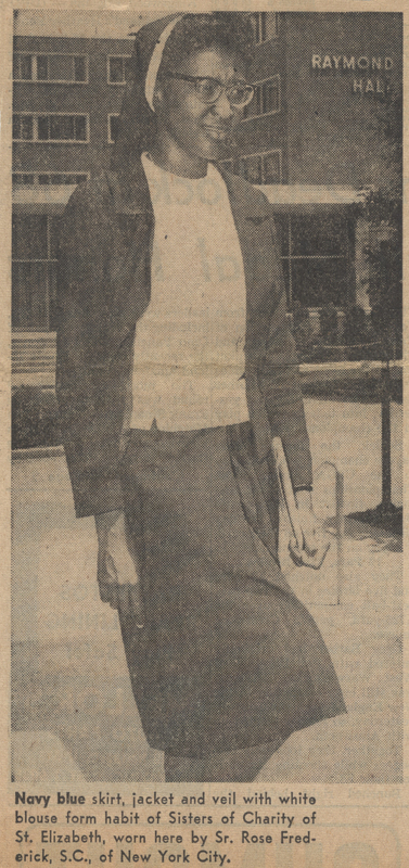 Newspaper photo of a sister in a habit walking along the sidewalk. The text below reads 'Navy blue skirt, jacket, and veil with white blouse form habit of Sisters of Charity of St. Elizabeth, black worn here by Sr. Rose Frederick, S.C., of New York City.'