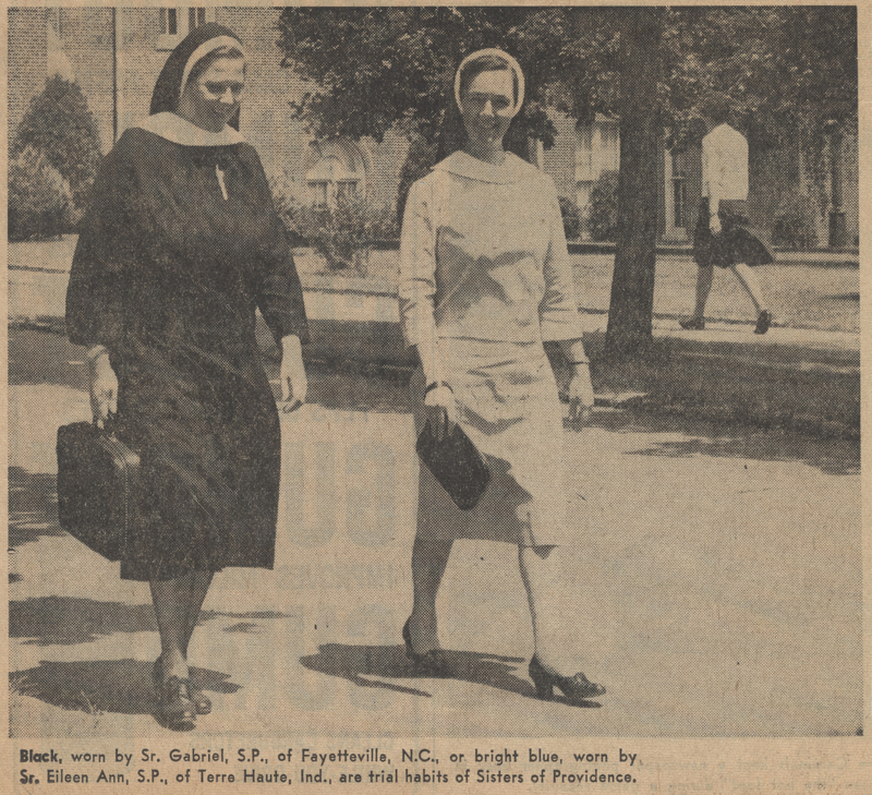 Newspaper photo of two sisters in habits walking along the sidewalk. The text below reads 'black worn by Sr. Gabriel, S.P., of Fayetteville N.C., or bright blue, worn by Sr. Eileen Ann, S.P., of Terre Haute Ind., are trial habits of Sisters of Providence.'