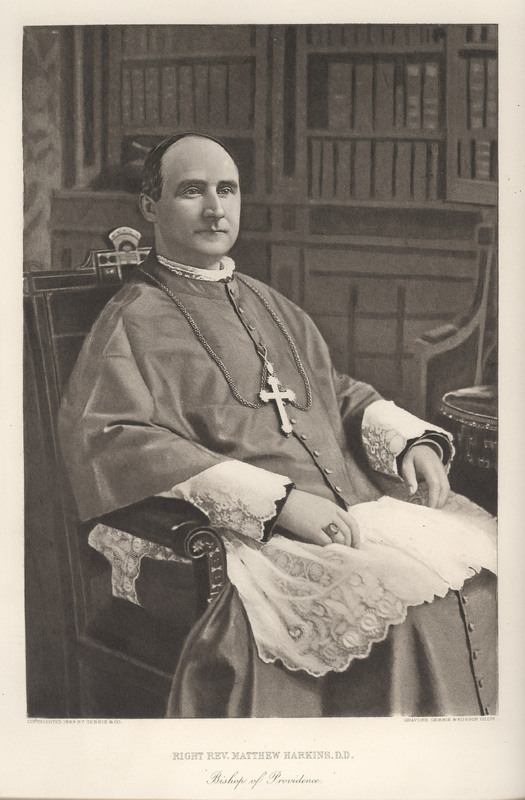 Portrait of Bishop Matthew Harkins from 1889, seated in clerical attire with a pectoral cross, set against a backdrop of bookshelves.