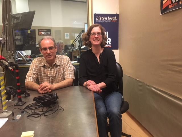 Jennifer Illuzzi and Arthur Urbano sitting in a radio station for RI NPR.