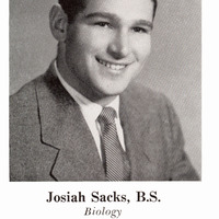 Yearbook photo of Josiah Sacks in a suit and tie, with accompanying text listing academic achievements and club memberships.