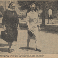 Newspaper photo of two sisters in habits walking along the sidewalk. The text below reads 'black worn by Sr. Gabriel, S.P., of Fayetteville N.C., or bright blue, worn by Sr. Eileen Ann, S.P., of Terre Haute Ind., are trial habits of Sisters of Providence.'