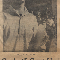 Black and white newspaper clipping featuring a photograph of a student wearing glasses and holding a book. The headline reads 'Coeds - A Great Idea' by George Popkin. The article discusses the presence of female students at Providence College, with the man in the photograph, Michael Ruddy, expressing support for the idea.