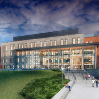 Rendering of modern multi-story building with glass, brick, and stone exterior, surrounded by trees and lawn, with people sitting on benches along a wide staircase under a partly cloudy sunset sky.