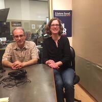 Jennifer Illuzzi and Arthur Urbano sitting in a radio station for RI NPR.
